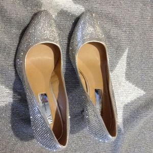 InC. Silver glitter heels size 6M.